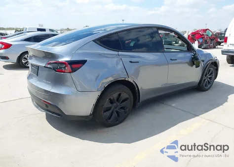2024 Tesla Model Y Long Range Dual Motor All-Wheel Drive z USA, uszkodzony, nr VIN 7SAYGDEE7RA320490